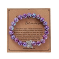 Unisex turquoise beaded bracelet with purple stone beads and a silver butterfly charm - Emperor Stone Purple Spotted Butterfly Bracelet
