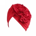 Detailed view of red stretch turban hat featuring elegant 3D layered fabric flowers - One Size / Red