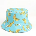 Detail of light blue bucket hat featuring vibrant yellow banana patterns and stitching - Banana Blue