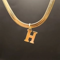 Elegant gold flat snake chain necklace featuring a minimalist letter H pendant charm - Letter H (5592272000728)