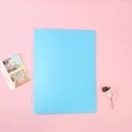 Minimalist sky blue A4 document folder organizer in a clean aesthetic setting - A4/20 Pages / Solid Blue