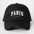 Detailed view of the white Paris France printed logo on a black cotton baseball cap - One Size / Black