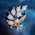 Elegant gold flower bouquet brooch with white pearls and rhinestones on blue silk - Lavender Brooch