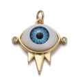 Golden Evil Eye pendant with blue zircon inlay and three spiked details on white background - CX141-10 Three Spike Eye