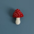 Handmade crochet red and white mushroom brooch pin crafted from soft wool yarn - Red Mushroom Brooch