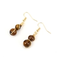 Detail of tiger eye beads with gold wire wrapping on handmade dangle hook earrings - Gold + Tiger Eye