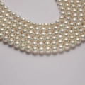 Elegant multi-strand white pearl necklace with high luster and polished round beads - Creamy White 8mm/40cm
