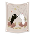 Close-up of bohemian Cancer zodiac tapestry with pink roses and golden astrology symbols - Cancer