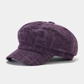Detailed view of the purple tweed texture on the British style newsboy octagonal cap - Purple