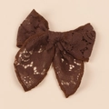 Detailed view of a brown lace bow hair clip with intricate floral patterns and textures - Dark Coffee