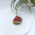 Mini shell-shaped hair claw clip with colorful marble resin patterns on white stone - Shell Rainbow 2.6cm