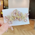 Pink crystal butterfly hair clip with golden alloy frame on handmade jewelry card - Pink
