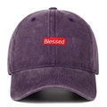 Close-up of Blessed letter embroidery on vintage purple washed cotton baseball cap - Purple