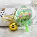 Green lollipop oil-filled shaker keychain with golden bell and colorful sequins - Bell Style [Green]