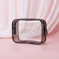 Transparent PVC makeup bag with black trim on soft pink fabric background - 17*6*12cm / Gray