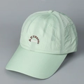 Detail of authentic embroidered mint green baseball cap made of lightweight wavy fabric - M (56-58cm) / Green