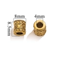 Golden stainless steel spacer bead with vintage relief for DIY jewelry, 8mm wide - Dot / Gold