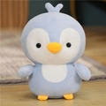 Weiches hellblaues Pinguin-Plüschtier mit weißem Bauch und gelbem Schnabel - Blau / 35cm