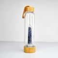 Crystal energy glass water bottle with blue crushed stones and bamboo lid - Lapis Lazuli