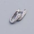 Elegant silver U-shaped hoop earrings with sparkling cubic zirconia on a gray background - White Zirconia Style / Platinum (White Stone)
