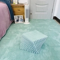 Light blue plush interlocking foam tiles stacked and spread on bedroom floor - Mint Green