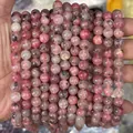 Natural pink phantom quartz round beads for DIY jewelry making in multiple strands - Natural Rhodonite