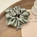Premium grey-green large satin scrunchie with elegant golden metal brand pendant - Green