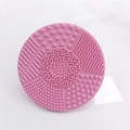 Portable pink silicone makeup brush cleaning mat with suction cups and textured surface - Round Shape / Pink