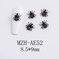 Macro shot of silver spider nail charms with black rhinestones on white nail tips - AE52-Black Rhinestone Spider