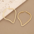Golden geometric heart earrings with sparkling micro-pave zircons on a marble background - Irregular Heart Shape (1#)