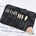 12-piece black makeup brush set with golden ferrule and black leather roll-up bag - 12 Pcs Matte Gold Brushes With Black Wrap Bag