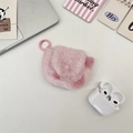 Macro detail of plush pink heart earphone case with a metallic hook and headphones - Light Pink