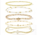 5pcs gold and cream beaded bracelet set with cross charms for a summer beach look - White Gold 5-Piece Set