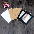 Set of white, kraft, and black paper photo frames with small wooden clips for wall decor - 3-inch Black White Kraft 10pcs Set With Clips Rope