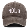 Detailed close-up of vintage washed cotton NOLA embroidery on a dark brown baseball cap - Adjustable / Coffee