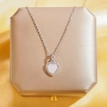 Collier élégant avec pendentif cœur en nacre, chaîne argentée et bordure perlée en boîte - Cœur en Coquille Naturelle Argent