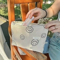 Borsa cosmetica in velluto a coste color crema con faccina nera e cerniera per trucco - Bianco Sporco