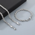 Detalle del conjunto de cadena y pulsera de cuerda plateada con cierre de langosta - Pulsera 8mm Ancho x 21.5cm Largo / Color Acero