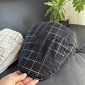 Detailed macro view showing breathable linen blend fabric and retro plaid pattern on flat caps - M (56-58cm) / Black