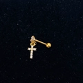 Detailed close-up of a gold stainless steel barbell earring with a zircon cross pendant - Gold-Cross