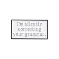 Detailed view of enamel rectangle brooch with I'm silently correcting your grammar text - Grammar Correction Style (QHXZ058)
