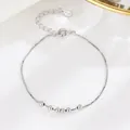 Bracciale minimalista in argento sterling S925 con sfere lucide e catena regolabile - Argento 925 / Oro Bianco