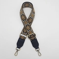 Detail of adjustable 38mm canvas bag strap with retro ethnic embroidery and bronze buckle - Black Background Brown Pattern Black Leather [Rich Flower]