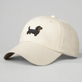 Beige baseball cap featuring 3D embroidered dachshund with adjustable curved brim design - One Size / Beige