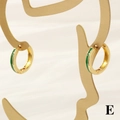 Close-up of 18K gold-plated green enamel hoop earrings on a gold face profile display - 3*15mm / Green