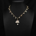 Christmas-themed necklace with freshwater pearls and reindeer charms on a golden chain - Christmas Snowflake Reindeer Pearl Necklace