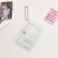 Close-up of clear PVC card holder with silver ball chain and secure snap button closure - Transparent White