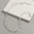 Transparente Acryl-Gliederkette mit silbernem Karabinerverschluss auf Displaybox - Transparent Weiß