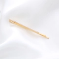Detailed macro view of the gold-plated hair clip with neatly hand-set white pearls - Thin Rod Pearl Clip