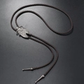 Vintage western bolo tie with cicada pendant on brown leather cord over black background - Dark Coffee Cicada